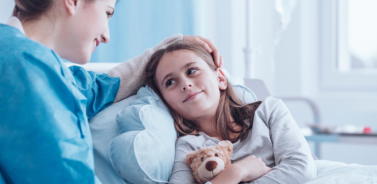 Caregiver spending time with sick child